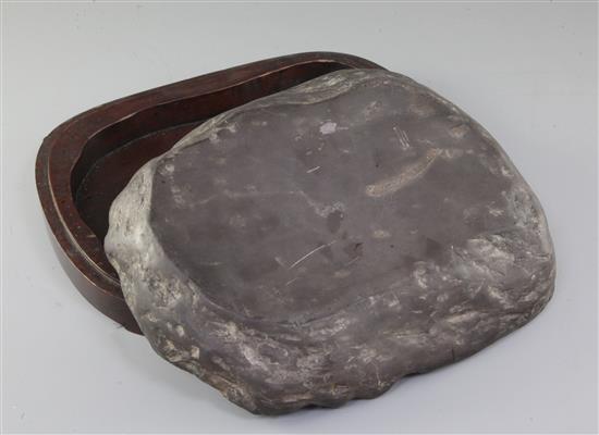 A Chinese slate ink stone, 19th century, total length 28cm